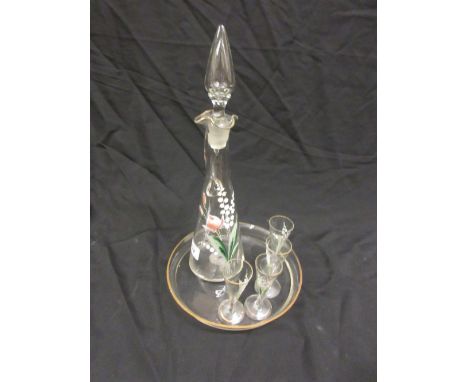 Late 19th or early 20th Century liqueur decanter and four matching glasses on a tray decorated in enamels with lily of the va