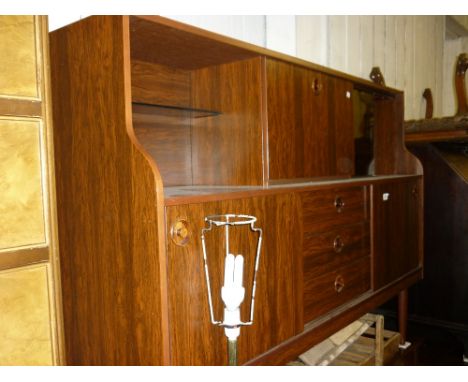 Greaves and Thomas, simulated rosewood side cabinet with a drop front flanked by open shelf and glazed doors above three draw