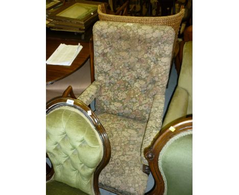 19th Century mahogany open arm library chair having button upholstered back, raised on turned tapering front supports with br