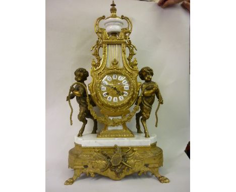 Mid 20th Century Continental gilt brass and marble mounted lyre form mantel clock, the urn surmount above Roman cartouche num