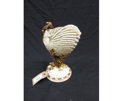 Royal Worcester shell form vase decorated with gilded shells and a figure of a lizard