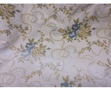 Pair of floral decorated curtains on a cream ground