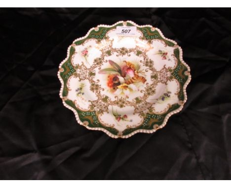 Late 19th Century Worcester cabinet plate painted with orchids within a green and gilt border