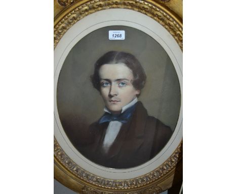 19th Century oval pastel head and shoulder portrait of a gentleman, gilt framed, unsigned, 16ins x 13ins