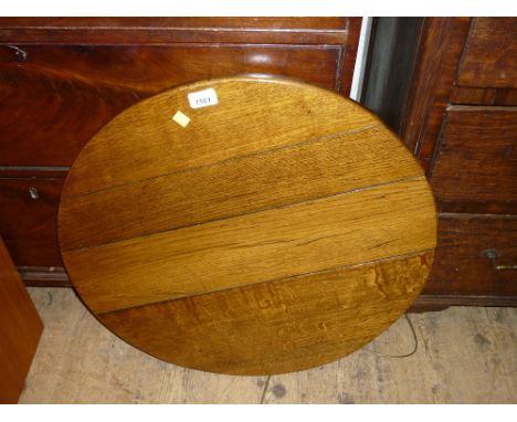 Mid 18th Century oak circular pedestal table with a turned tapering column support and tripod base