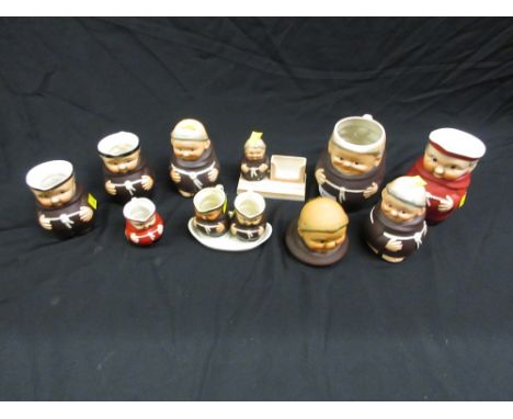 Group of nine Goebel monk jugs etc together with a similar condiment set
