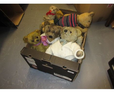 Box containing a collection of various vintage teddy bears