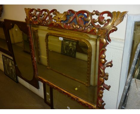 Late 19th or early 20th Century Florentine red painted and parcel gilt cushion framed wall mirror (with damages)