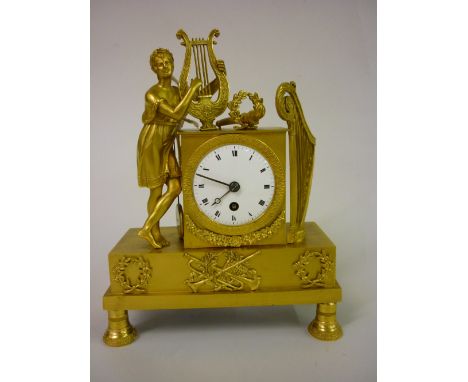 Small 19th Century French ormolu and mantel clock, the case mounted with figures playing a lyre and opposing harpist, the cir
