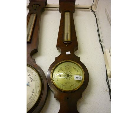 Early 19th Century figured mahogany banjo shaped wheel barometer thermometer with circular 6in dial and bow glass thermometer