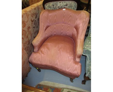 Late 19th / early 20th Century tub shaped armchair having loose cushion raised on turned tapering reeded supports with brass 