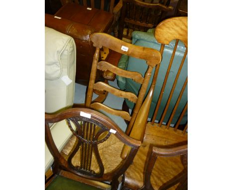 19th Century fruitwood rocking chair with ladder back above a rush seat
