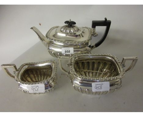 Birmingham silver three piece tea service of rectangular half fluted design