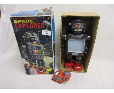 Boxed Japanese battery operated tin plate robot explorer, together with a small Japanese clockwork tin plate robot