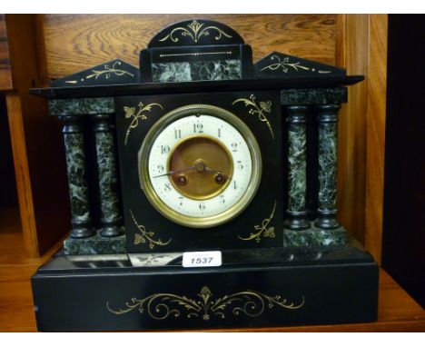 19th Century black slate and green flecked marble mantel clock, the enamel dial with Arabic numerals and two train movement