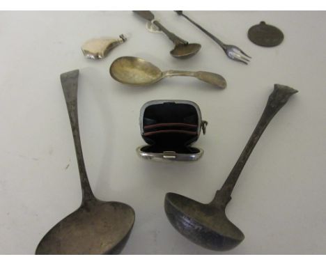 Small silver purse, two Scottish silver sauce ladles, silver caddy spoon and four other small items