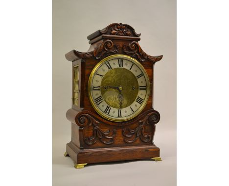 Victorian rosewood bracket clock, the brass and silvered dial enclosing a three train fusee musical movement, chiming on bell