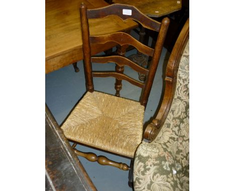 Harlequin set of six 18th / 19th Century elm ladder back dining chairs with rush seats together with a pair of splat back rus