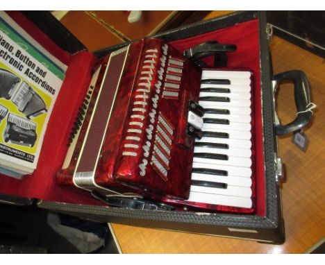 48 Button piano accordion in a fitted case