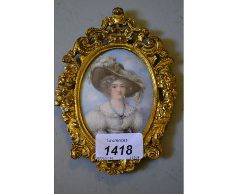 Oval miniature watercolour, head and shoulder portrait of a lady wearing a feathered hat housed in an ormolu frame