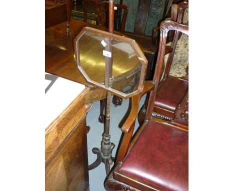 Regency mahogany pole screen on tripod supports