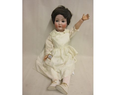 Kammer and Rheinhart bisque headed doll having sleeping eyes with fully jointed body, the head marked K. and H. 117N, Germany