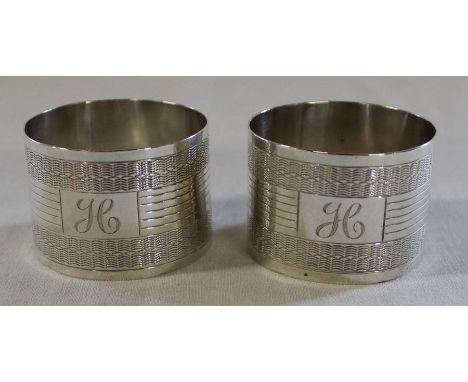 Pair of silver napkin rings with engine turned decoration and initialled H,&nbsp; Birmingham 1920 1.5ozt