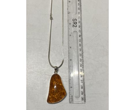 A 925 silver chain and Amber style pendant 
