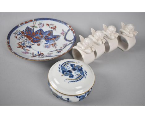 A Set of Four Creamware Napkin Rings with Cherub Decoration, A Copeland and Garrett Late Spode Saucer and a Meissen Circular 