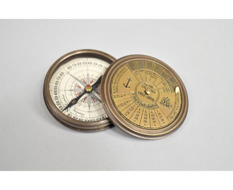 A Reproduction Circular Brass Compass, Screw off lid Engraved with 100 Year Calendar, 1957-2056, 7.5cms Diameter 