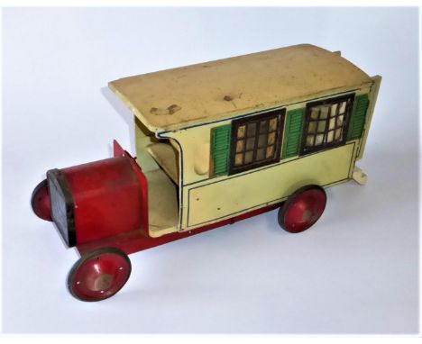 A c1930 Tri-ang Motor Caravanette A rare floor toy, being a cross between a vehicle and a doll's house. It possesses its orig