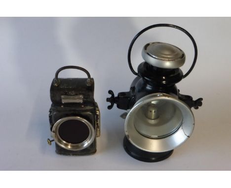 A Lucas Ltd. Lamp An oil-powered lamp for a commercial vehicle with a rare electric light adaptor; also, a Lucas 'Sentry' No 