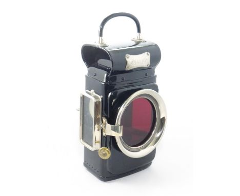 A C330 Series 'Sentry' Rear Lamp An oil-powered rear lamp by Lucas Ltd., having an excellent black enamel finish and nickel-p