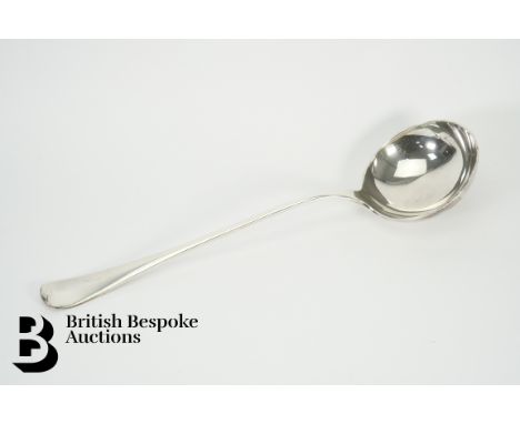 A silver punch ladle, rat tail design, London hallmark dated 1901, mm William Hutton &amp; Sons, approx 300 gms.&nbsp;