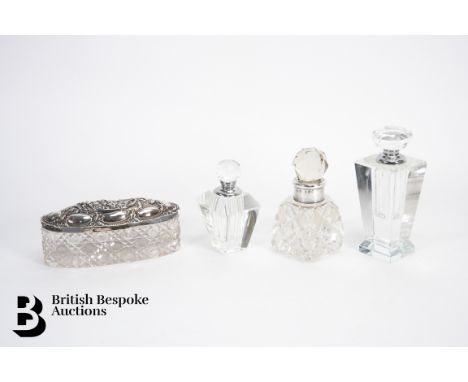 Collection of scent bottles, one silver collared, two Art Deco, one trinket dish with silver cover (af) and a silver comb.&nb