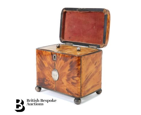 George III tortoiseshell two compartment tea caddy, domed top with white metal mounts, cartouche engraved M.A.C, the interior