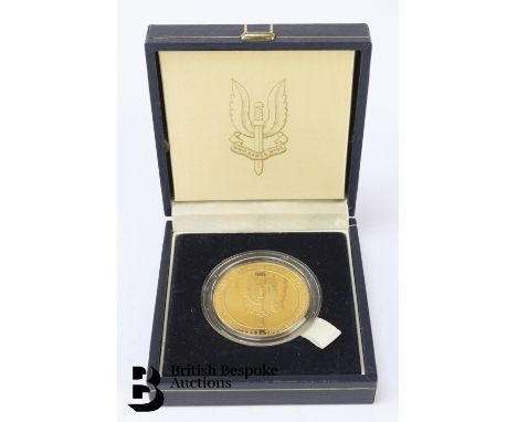 A gold-plated limited edition silver medal (no denomination), 2002, celebrating H.M Queen Elizabeth II Golden Jubilee (1952-2