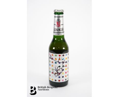 Damien Hirst (b.1965 - ), Becks Beer bottle, offset lithograph 'Opium spot design is signed in ink with a sketch of a butterf