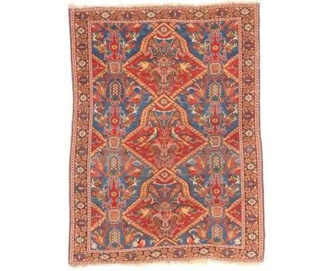 Afshar RugSouth East Iran, circa 1920The pale blue abrashed field with three medallions surrounded by tribal devices enclosed