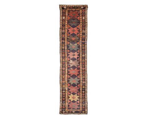 Shah Savan RunnerNorth West Iran, circa 1910The field with a column of stars enclosed by borders of polychrome stepped flower