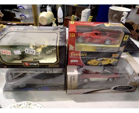 Four model cars 1:24 - 1:16 scale including Burago. Not available for in-house P&amp;P 