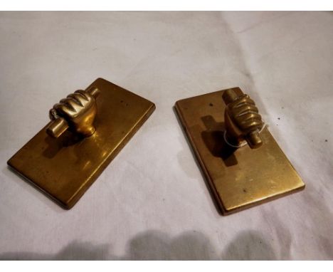 Two Victorian brass clenched fist desk weights, 50 x 80 mm. UK P&amp;P Group 1 (£16+VAT for the first lot and £2+VAT for subs