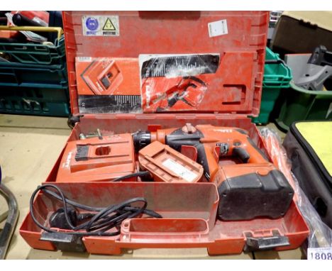 Hilti 24v drill with two batteries and charger. All electrical items in this lot have been PAT tested for safety and have pas