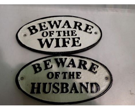 Cast iron Beware of the Wife sign, and a cast iron Beware of the Husband, both L: 16 cm. UK P&amp;P Group 1 (£16+VAT for the 