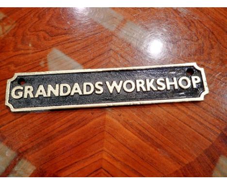Cast iron Grandads Workshop sign. W: 18 cm.UK P&amp;P Group 1 (£16+VAT for the first lot and £2+VAT for subsequent lots) 