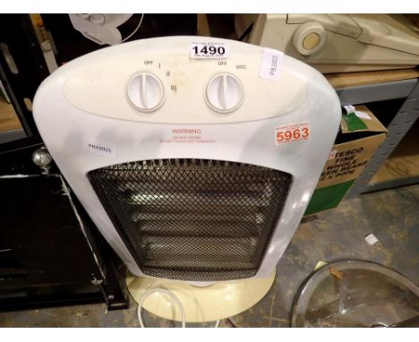 Floor standing filament heater. All electrical items in this lot have been PAT tested for safety and have passed. This does n
