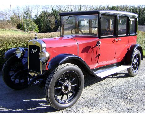 - Reportedly `restored to a very high standard' and `driving very well'

- Maroon deep-button upholstery and larger 1861cc en