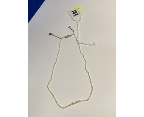 A seed pearl necklace