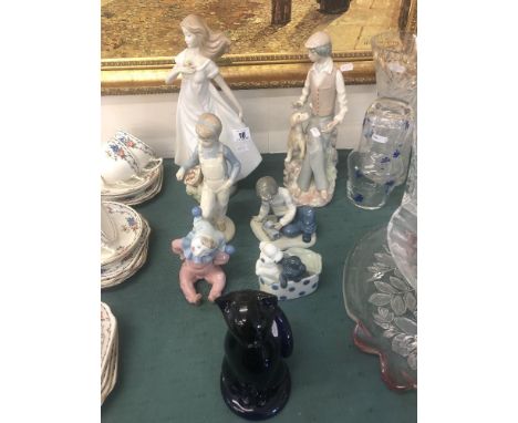 Six Nao figures and Bristol blue cat