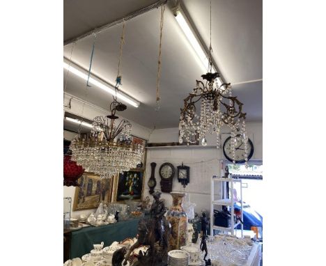 A crystal chandelier plus another